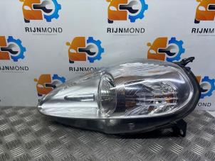 Used Headlight, left Fiat Grande Punto (199) 1.4 Price € 50,00 Margin scheme offered by Autodemontage Rijnmond BV