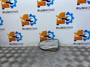 Used Mirror glass, left Kia Rio III (UB) 1.1 CRDi VGT 12V Price on request offered by Autodemontage Rijnmond BV