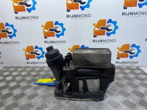 Used Oil filter housing BMW 5 serie (F10) 530d 24V Blue Performance Price on request offered by Autodemontage Rijnmond BV