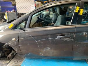 Usados Puerta de 4 puertas izquierda delante Opel Corsa E 1.4 16V Precio € 393,25 IVA incluido ofrecido por Autodemontage Rijnmond BV