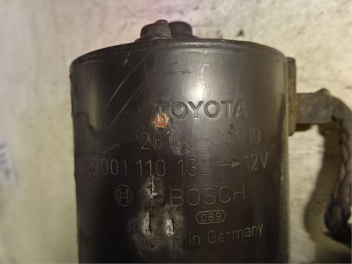 Starter from a Toyota Corolla (E12) 2.0 D-4D 16V 110 2003