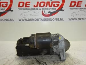 Starter from a Toyota Corolla (E12) 2.0 D-4D 16V 110 2003