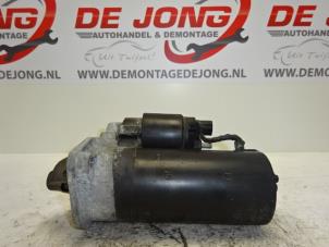 Starter from a Toyota Corolla (E12) 2.0 D-4D 16V 110 2003