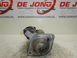 Starter from a Toyota Corolla (E12) 2.0 D-4D 16V 110 2003