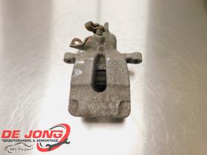 Used Rear brake calliper, left Renault Scénic II (JM) 2.0 16V Price € 19,99 Margin scheme offered by Autodemontagebedrijf de Jong