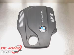 Używane Pokrywa silnika BMW 1 serie (F20) 118d 2.0 16V Cena € 38,99 Procedura marży oferowane przez Autodemontagebedrijf de Jong