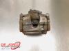 Front brake calliper, left from a Mercedes A (177.0), 2018 / 2026 1.3 A-180 Turbo 16V, Hatchback, Petrol, 1.332cc, 100kW, FWD, M282914, 2018-06, 177.087 2019