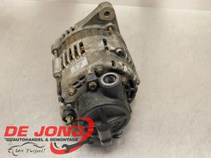 Dynamo från en Kia Carens III (FG) 2.0 CRDI VGT 16V 2009