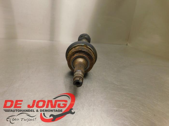 Front drive shaft, left from a Peugeot 208 I (CA/CC/CK/CL) 1.4 HDi 2013