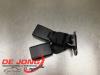Rear seatbelt buckle, centre from a Peugeot 208 I (CA/CC/CK/CL) 1.4 HDi 2013