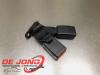 Rear seatbelt buckle, centre from a Peugeot 208 I (CA/CC/CK/CL) 1.4 HDi 2013