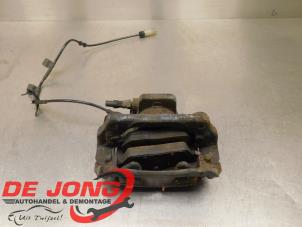 Used Front brake calliper, left Mini Clubman (R55) 1.6 Cooper D Price € 9,99 Margin scheme offered by Autodemontagebedrijf de Jong