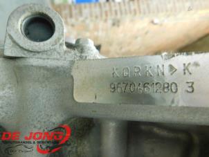 Engine crankcase from a Citroën C4 Grand Picasso (3A) 1.6 HDiF 16V 115 2014