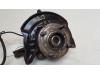 Knuckle, front left from a Daihatsu Sirion 2 (M3) 1.0 12V DVVT 2008