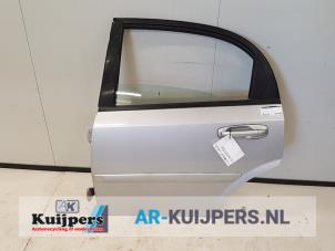 Używane Drzwi lewe tylne wersja 4-drzwiowa Chevrolet Lacetti (KLAN) 1.4 16V Cena € 50,00 Procedura marży oferowane przez Autorecycling Kuijpers