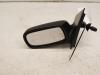 Wing mirror, left from a Toyota Yaris (P1), 1999 / 2005 1.0 16V VVT-i, Hatchback, Petrol, 998cc, 48kW (65pk), FWD, 1SZFE, 2003-03 / 2005-09, SCP10 2003