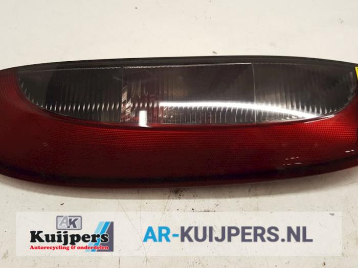 Taillight, left from a Opel Corsa C (F08/68) 1.2 16V 2003