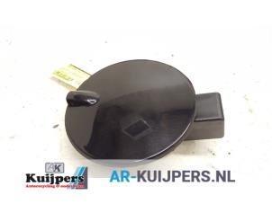 Used Tank cap cover Opel Corsa D 1.2 16V Price € 15,00 Margin scheme offered by Autorecycling Kuijpers