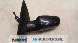 Used Wing mirror, left Renault Clio III (BR/CR) 1.4 16V Price € 14,00 Margin scheme offered by Autorecycling Kuijpers