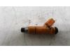 Injector (petrol injection) from a Daihatsu Cuore (L251/271/276) 1.0 12V DVVT 2009