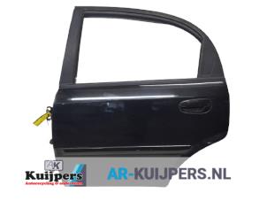 Używane Drzwi lewe tylne wersja 4-drzwiowa Chevrolet Lacetti (KLAN) 1.8 16V Cena € 50,00 Procedura marży oferowane przez Autorecycling Kuijpers