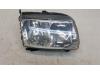 Headlight, right from a Volkswagen Polo III (6N2) 1.4 16V 75 2000