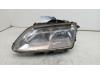 Headlight, left from a Renault Espace (JE) 1.9 dTi 2001