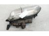 Headlight, left from a Renault Espace (JE) 1.9 dTi 2001