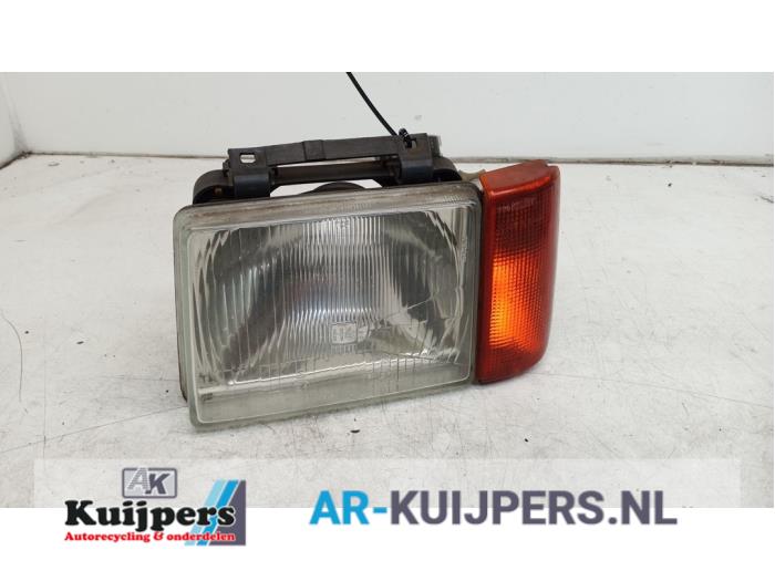 Headlight, left from a Opel Corsa A TR 1.2 S 1984