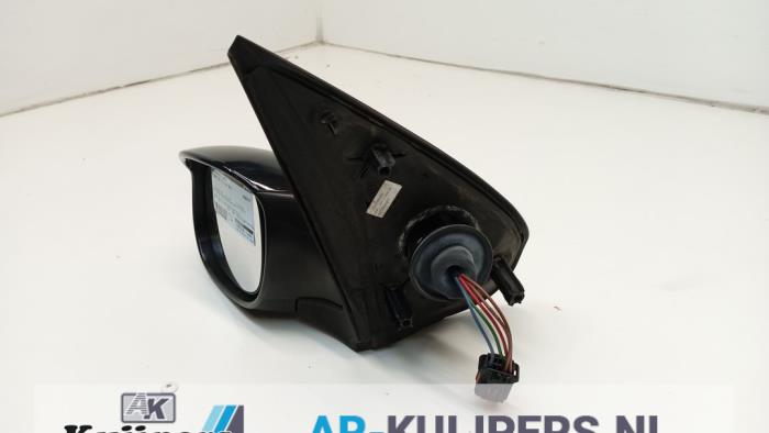 Wing mirror, left from a Peugeot 206+ (2L/M) 1.4 XS 2011