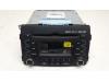 Radio CD player from a Kia Sorento II (XM), 2009 / 2015 2.4 16V 4x2, SUV, Petrol, 2.359cc, 128kW (174pk), FWD, G4KE, 2009-11 / 2015-12, XMF5P11; XMF7P11 2010