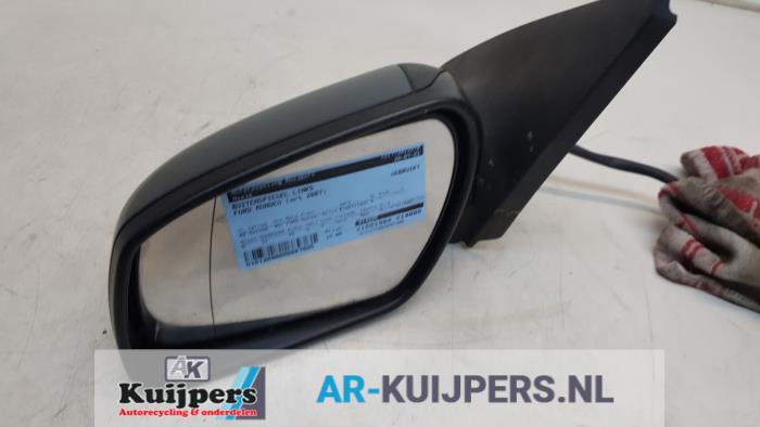 Wing mirror, left from a Ford Mondeo III 2.0 TDCi 115 16V Euro IV 2007