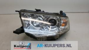 Used Headlight, left Mitsubishi L-200 2.5 DI-D 4x4 Price € 95,00 Margin scheme offered by Autorecycling Kuijpers