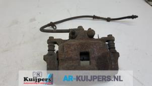 Used Front brake calliper, left Mitsubishi L-200 2.5 DI-D 4x4 Price € 45,00 Margin scheme offered by Autorecycling Kuijpers