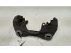 Front brake calliperholder, left from a Volkswagen Transporter T5, 2003 / 2015 2.0 TDI DRF, Delivery, Diesel, 1.968cc, 103kW (140pk), FWD, CAAC, 2009-09 / 2015-03, 7E; 7F 2010