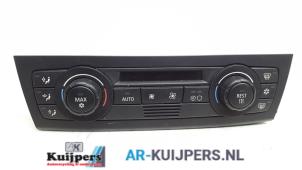 Usados Panel de control de calefacción BMW 1 serie (E87/87N) 116i 1.6 16V Precio € 20,00 Norma de margen ofrecido por Autorecycling Kuijpers