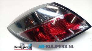 Used Taillight, left Opel Astra H GTC (L08) 1.4 16V Twinport Price € 15,00 Margin scheme offered by Autorecycling Kuijpers