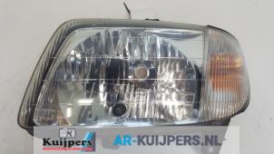 Used Headlight, left Daihatsu Cuore (L251/271/276) 1.0 12V DVVT Price € 20,00 Margin scheme offered by Autorecycling Kuijpers