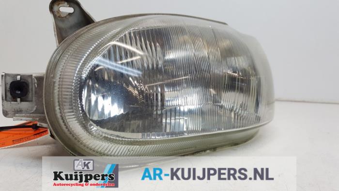 Headlight, left from a Ford Escort 6 (AAL/ABL) 1.6 16V 1996