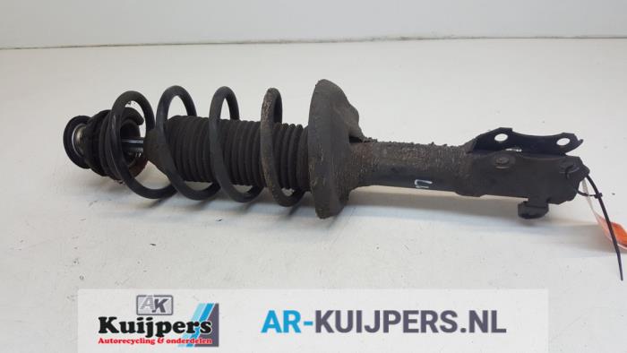 Front shock absorber rod, left from a Volkswagen Lupo (6X1) 1.4 16V 75 2000