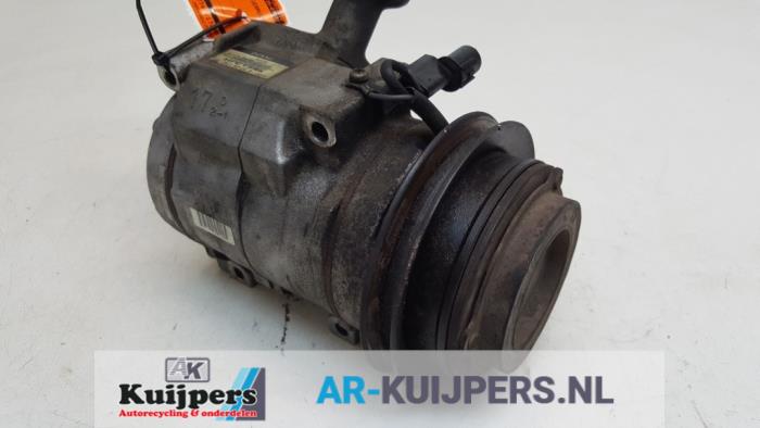Usagé Pompe clim Mitsubishi Pajero Canvas Top (V6/7) 3.2 DI-D 16V Prix € 85,00 Règlement à la marge proposé par Autorecycling Kuijpers