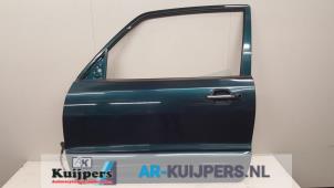 Używane Drzwi lewe przednie wersja 4-drzwiowa Mitsubishi Pajero Canvas Top (V6/7) 3.2 DI-D 16V Cena € 150,00 Procedura marży oferowane przez Autorecycling Kuijpers