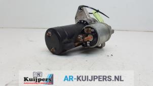 Anlasser van een Volkswagen Golf II (19E) 1.8 GTI 1985