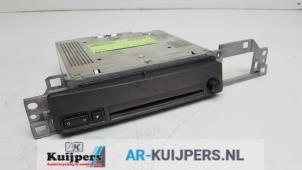 Usagé Lecteur CD BMW 7 serie (E65/E66/E67) 760i,Li 6.0 V12 48V Prix € 95,00 Règlement à la marge proposé par Autorecycling Kuijpers