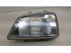 Headlight, left from a Daihatsu Terios (J1) 1.3 16V 4x4 1999