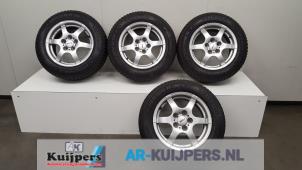 Usagé Kit jantes + pneus d'hivers Volkswagen Golf V (1K1) 1.6 FSI 16V Prix € 295,00 Règlement à la marge proposé par Autorecycling Kuijpers
