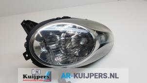 Używane Reflektor lewy Nissan Micra (K12) 1.2 16V Cena € 70,00 Procedura marży oferowane przez Autorecycling Kuijpers