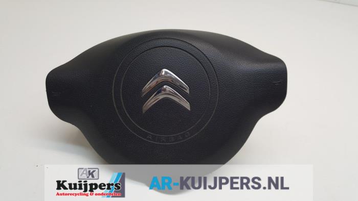Left airbag (steering wheel) from a Citroën Berlingo 1.6 Hdi 75 2012