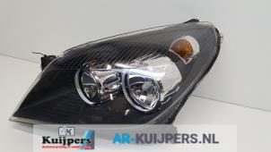 Usagé Phare gauche Opel Astra H (L48) 1.4 16V Twinport Prix € 65,00 Règlement à la marge proposé par Autorecycling Kuijpers