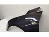Front wing, left from a Chevrolet Cruze (300) 1.8 16V VVT 2010